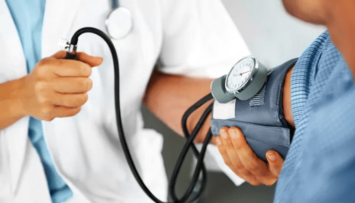 How does high blood pressure affect cardiovascular health?